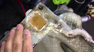 CHEVY TRUCK 350 5.7 COOLANT WATER IN OIL