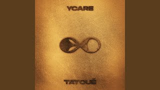 Tatoué