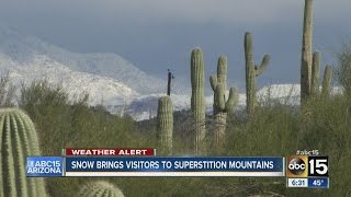 Snow brings visitors to the Superstition Mountains