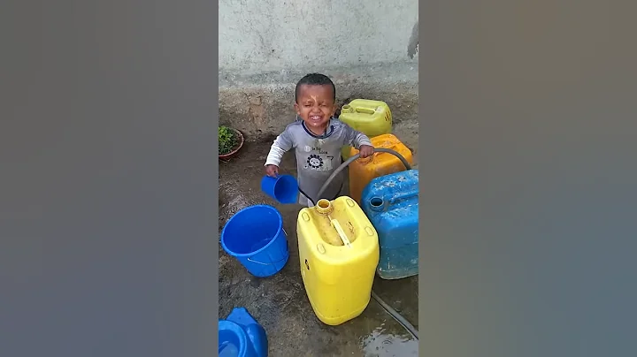 Ethiopian kid playing with water