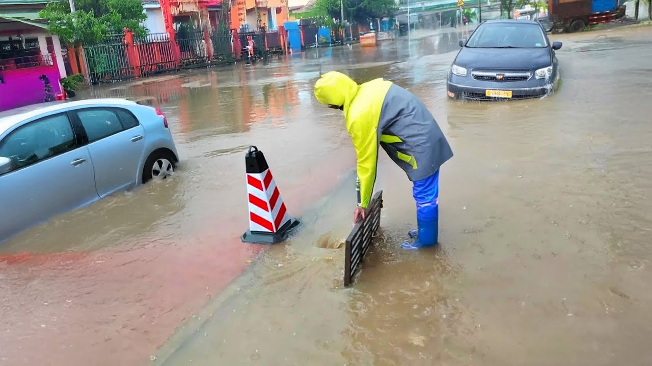 Storm Drain Triumph Flooded Street Cleared
