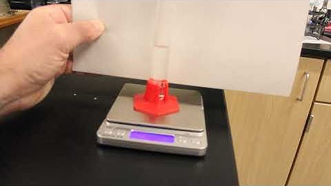 Density of an unknown liquid
