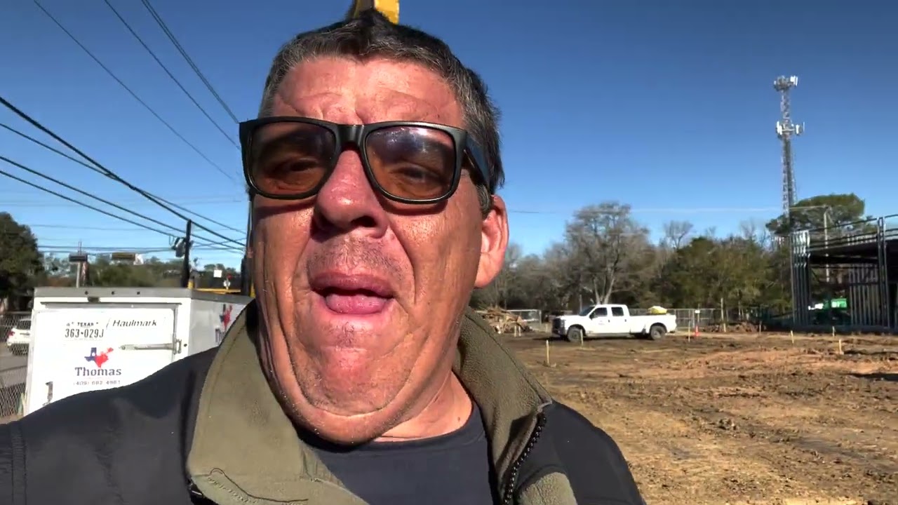 Setting Grade Stakes the" Old School Way", with scale & tape measure.