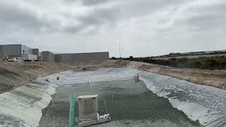 SRC - Slinging 5400 YDS of aggregates and soils into retention basin for customer in San Diego, CA.