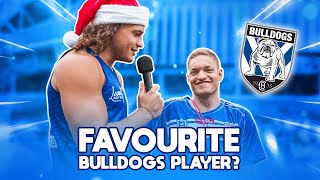 On the Mic: Jackson Topine roams the Bulldogs Members Christmas Party