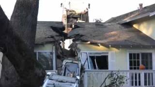 Crane Smashes House