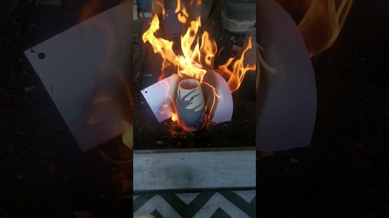 Raku fired Tsuri pottery vases. 