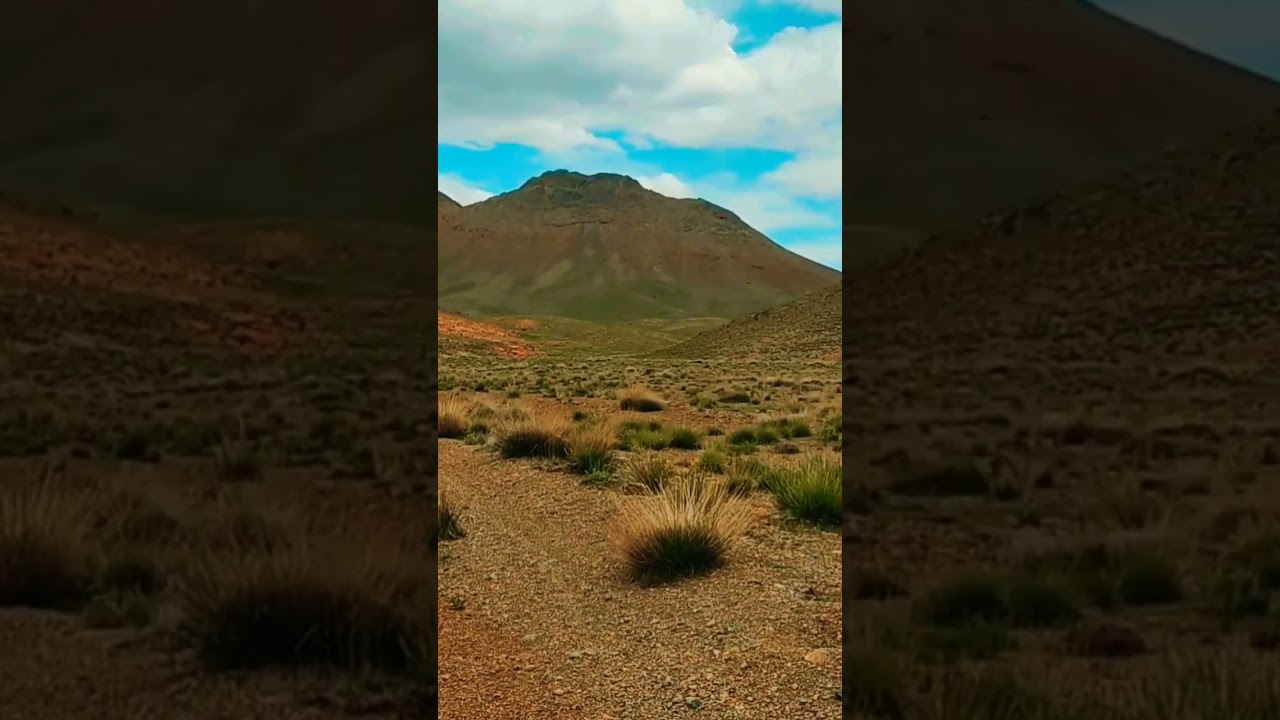 "Exploring the Majestic Peaks and Enchanting Skies of Dasht-e Kavir, Iran"