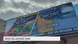 Quad Cities breweries duke it out through billboards on opposite sides of the river