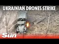 Ukrainian drones drop bombs on vehicles and trenches in the south