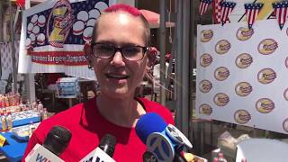 Ca. woman defends title in D.C. burger eating competition