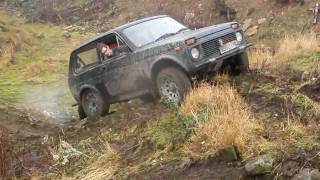 Land Rovers & Lada Niva play 'King of the hill'