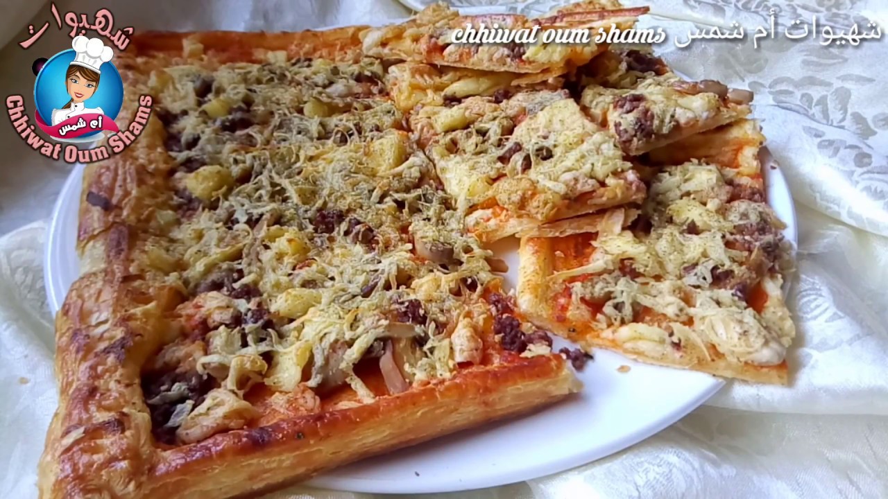 بيتزا بالعجين المورق السحري والصلصة الرائعة والغنية لا تفوتكم تجربتها باستعمال الجبن الاقتصادي👌