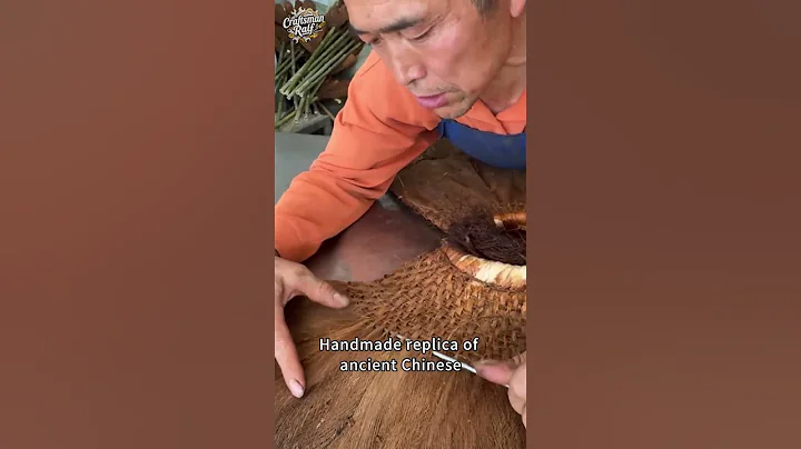 Handmade replica of ancient Chinese raincoats made from palm leaves