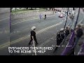 Shocking moment man walks away after being hit by bus
