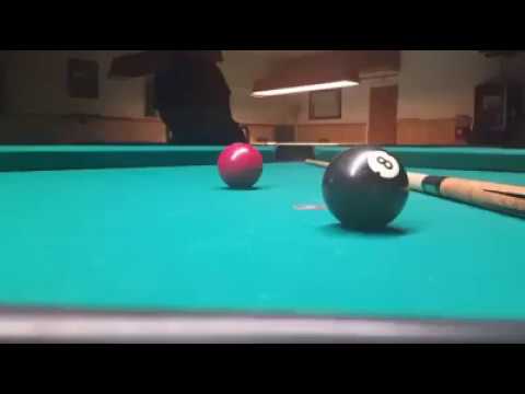 Friends Cheering While Their Friend Aiming For Billiards Ball