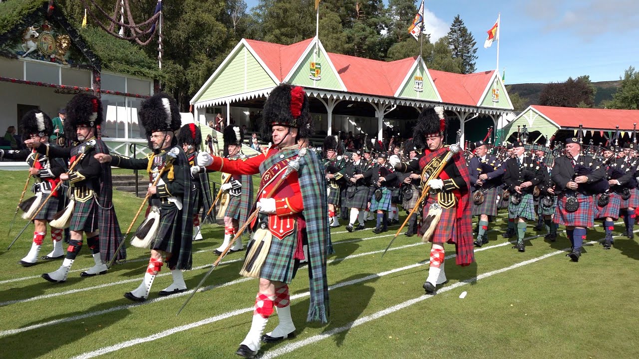 Massed Pipes and Drums parade during the 2019 Braemar Gathering led by