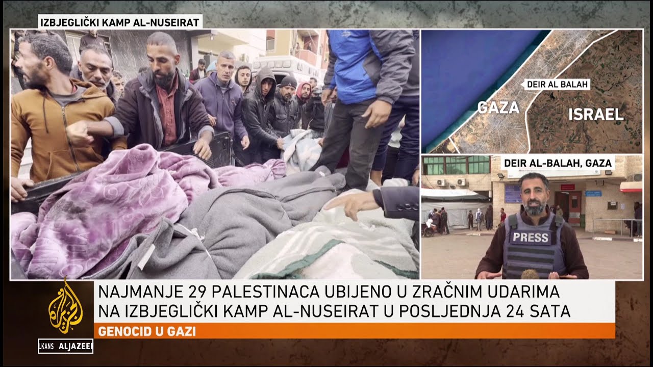 يقوم رجال الإنقاذ بجمع جثث القتلى في شوارع مخيم النصيرات