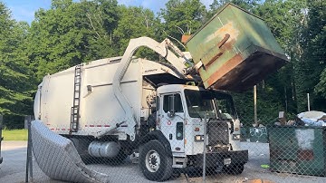 Peterbilt 320 New Way Mammoth Front Loader Garbage Truck on Overstuffed Dumpsters