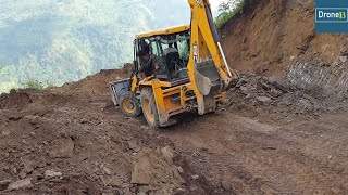 Hilly Road Extension-JCB Backhoe Loader-Cutting and Leveling Road