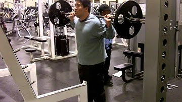 Squats with 135 lbs for 50 reps