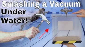 Smashing a Vacuum Chamber Under Water—Is There a Bubble?