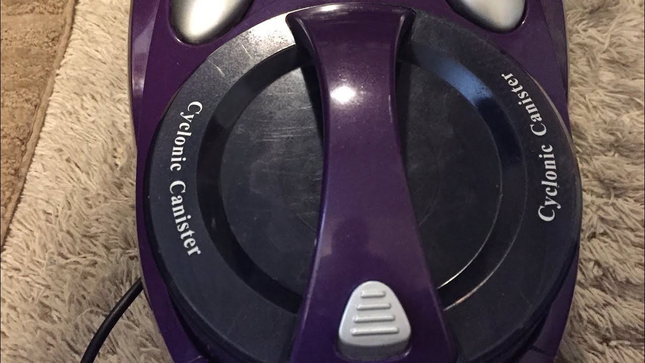 Cyclone canister vacuum cleaning my room