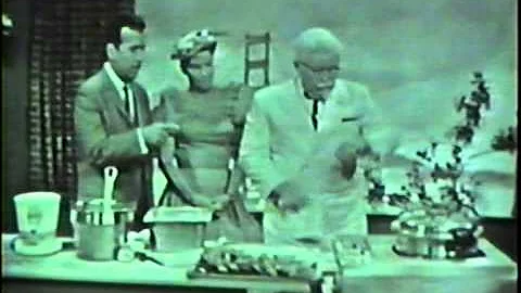 Colonel Harland Sanders shows Tennessee Ernie Ford...
