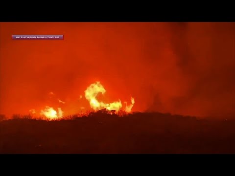 Crews battle wind-whipped California brushfire