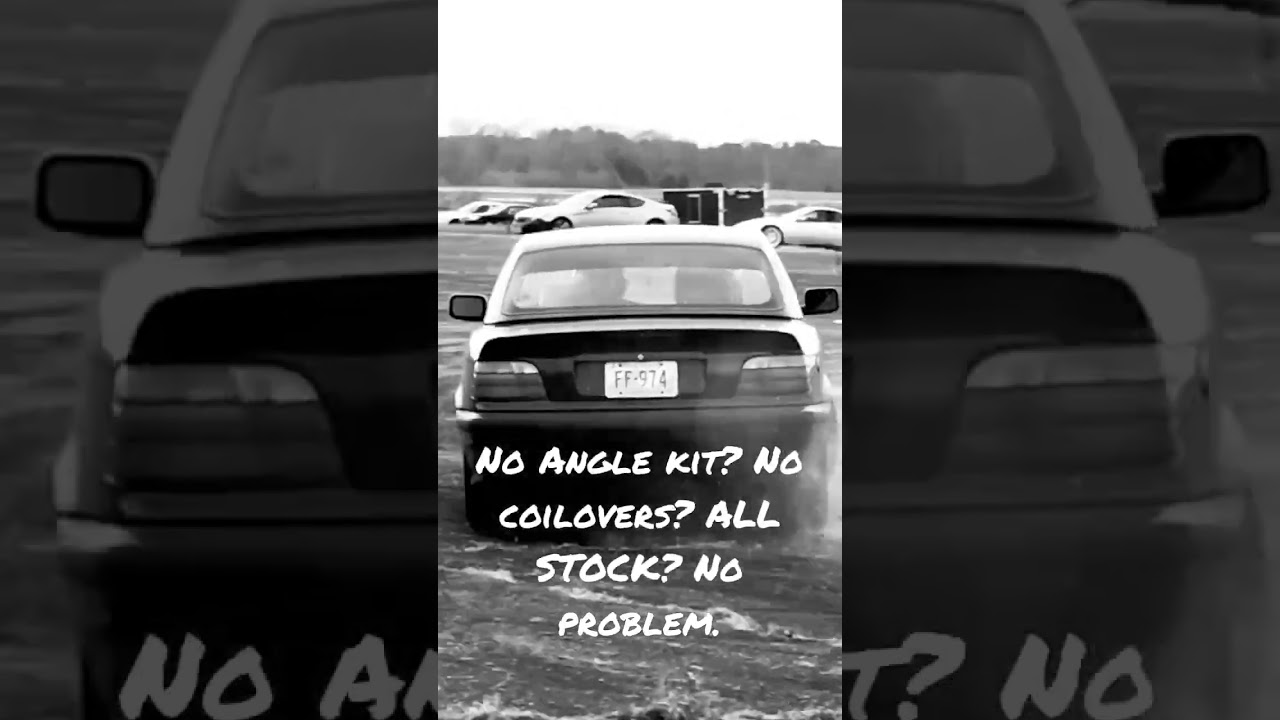 Bone stock E36 Convertible drifting like the Mad German it is....  