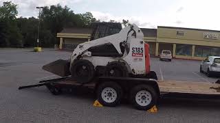 LOADING SKID STEER TIPS HORNUNG