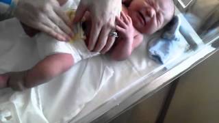 Mommas first diaper change.