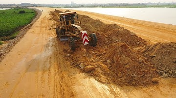 Skill Operator CAT 140G Motor Grader Working Grading Top Soil And Mini Dump Truck Dumping Soil Part1