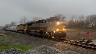 CP 7014 and KCS Grey 4503 as a DPU lead a manifest through Malvern, AR
