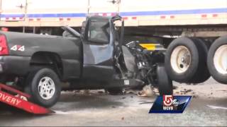 Man rescued after being pinned under tractor-trailer