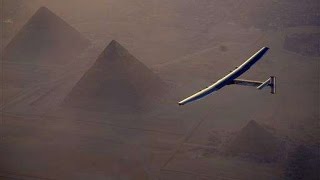 Solar plane flies over Egypt pyramids on globe-circling trip