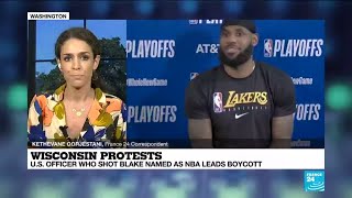Wisconsin protests latest: US officer who shot Blake named as NBA leads boycott