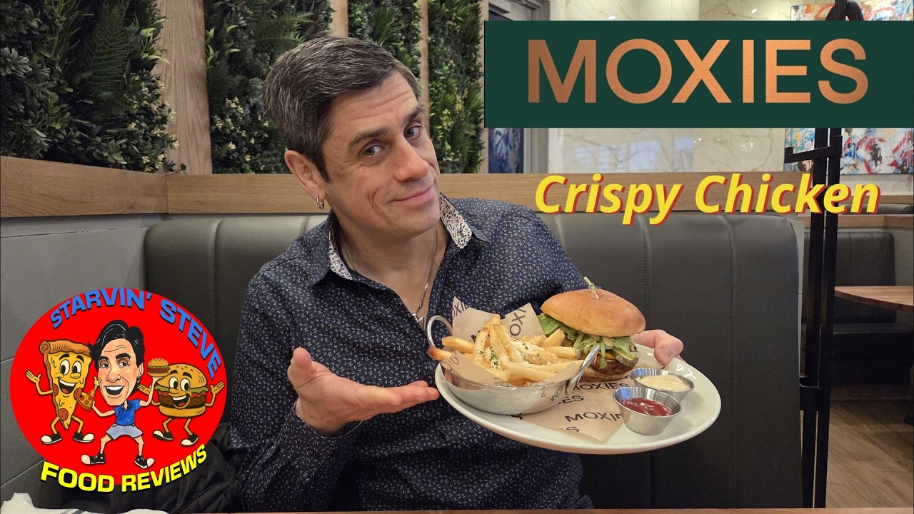 Сэндвич с хрустящим куриным бедром в ресторане «Моксис».