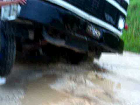 Truck sinks in middle street Belize
