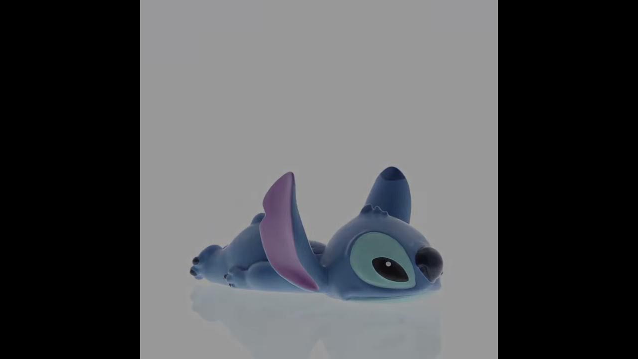 Disney Showcase Stitch Laying Down Mini Figurine