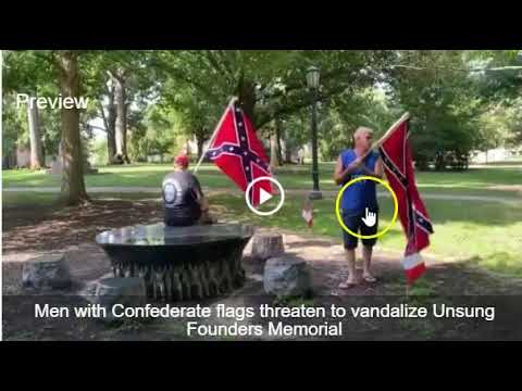 Two Confederate Flag Carrying Parasites Vandalize UNC African American Memorial