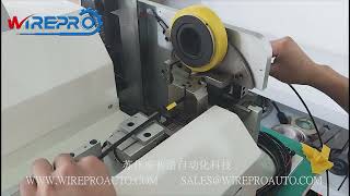 Automatic harness tube spot tape wrapping machine.
