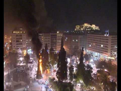 burning christmas tree in athens