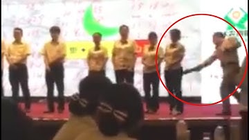 Chinese bank manager spanks employees for poor performance, Watch video | Oneindia News