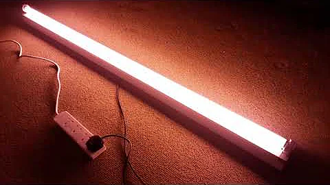 Crompton 5 foot fluorescent striplight with a red T8 fluorescent tube