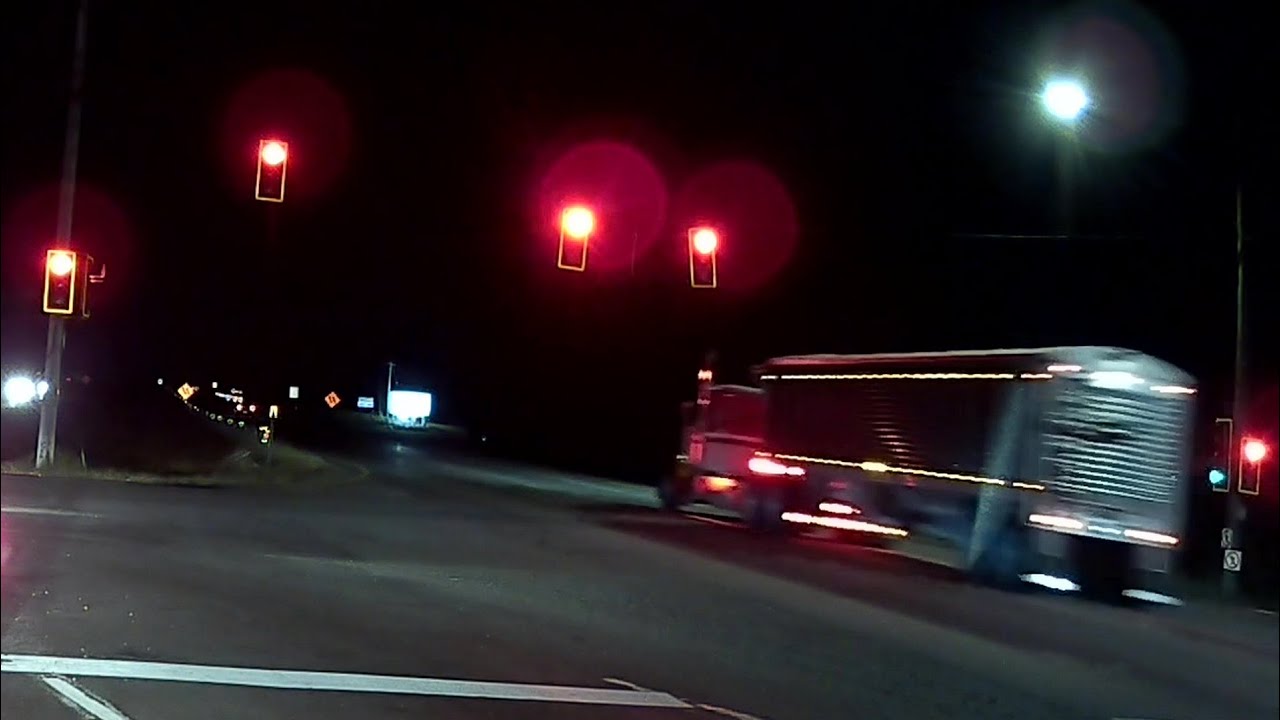 Semi runs red light - YouTube
