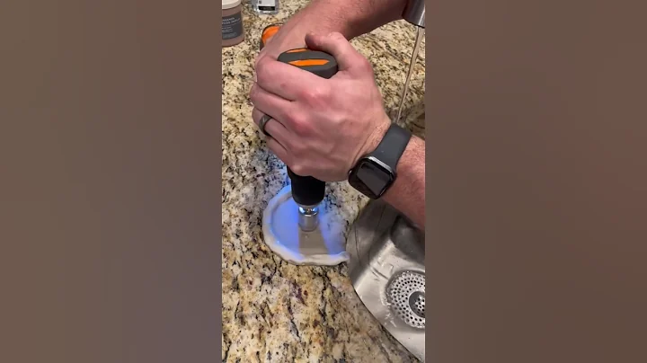 Drilling through a kitchen counter to install a reverse osmosis filtration system faucet. #plumber