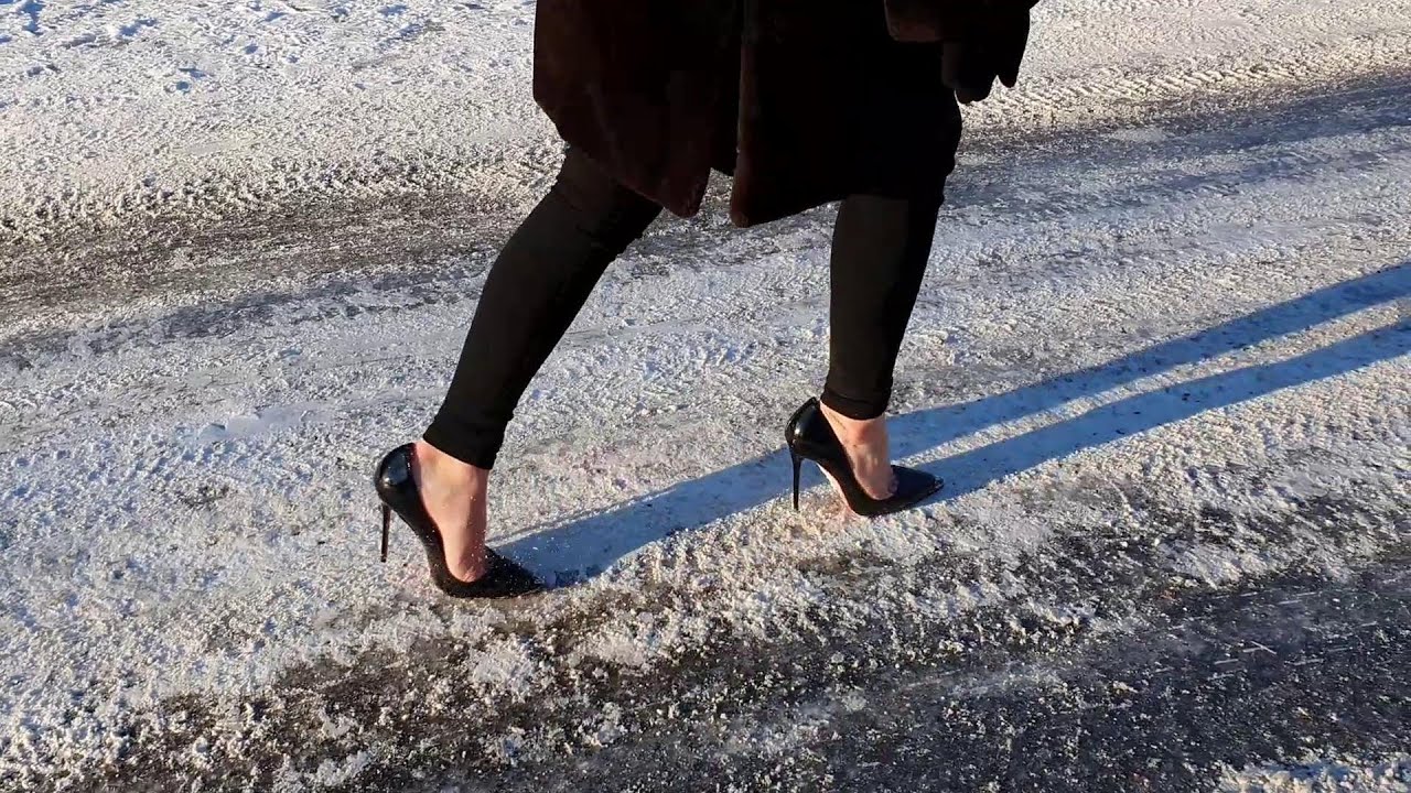 Louboutin pumps on very slippy ice, louboutin sliding on ice, girl walking in louboutin (scene 636)
