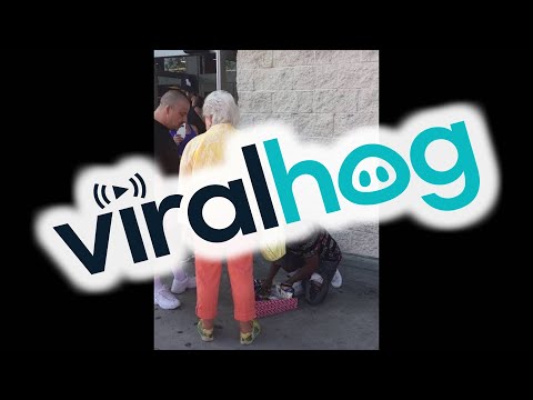 Lady Confronts Kid Outside of Target for Selling Candy || ViralHog