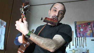 Country songs on a reentrant and a linear tuning baritone  ukulele:Va.